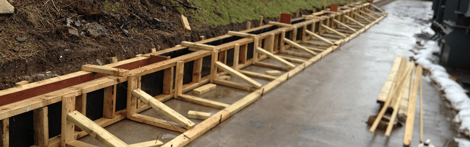 rectangle image of wooden frame being installed on civils project